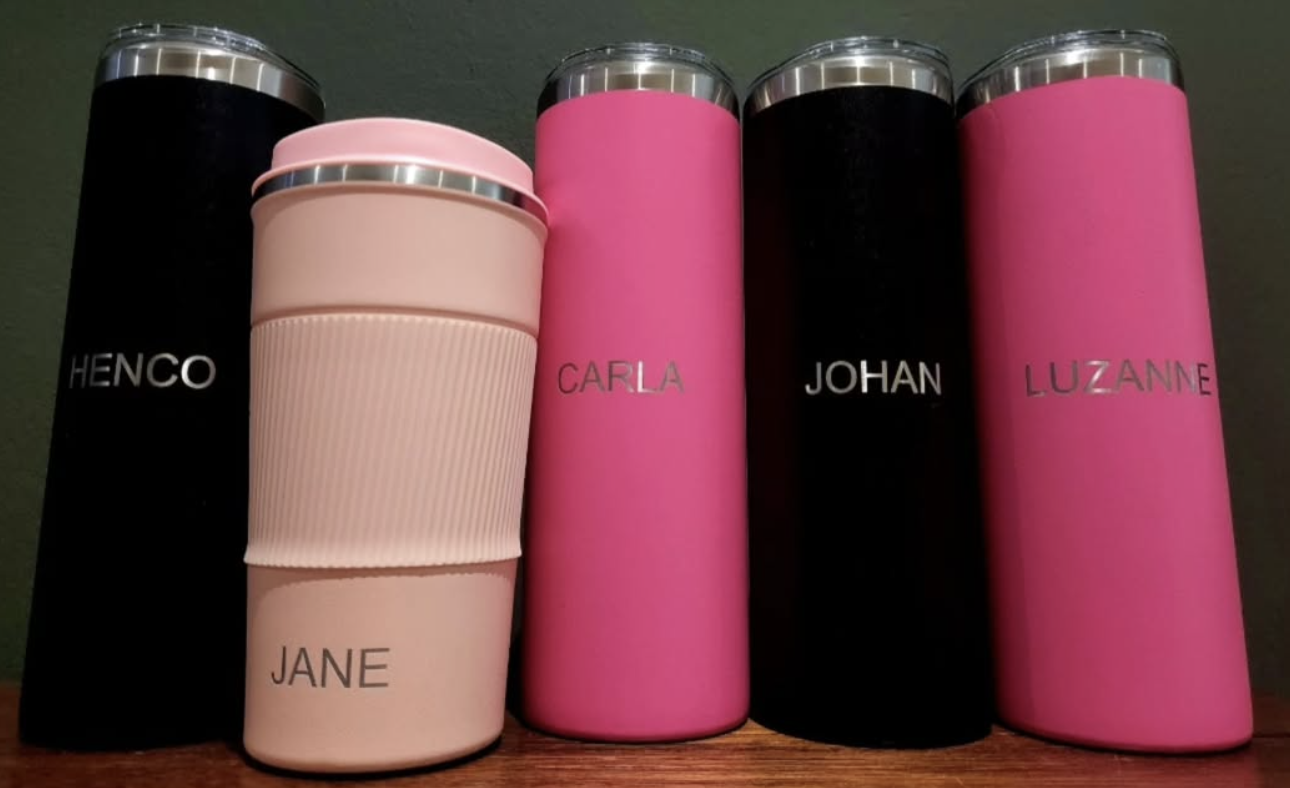 Collection of custom engraved tumblers by WESS