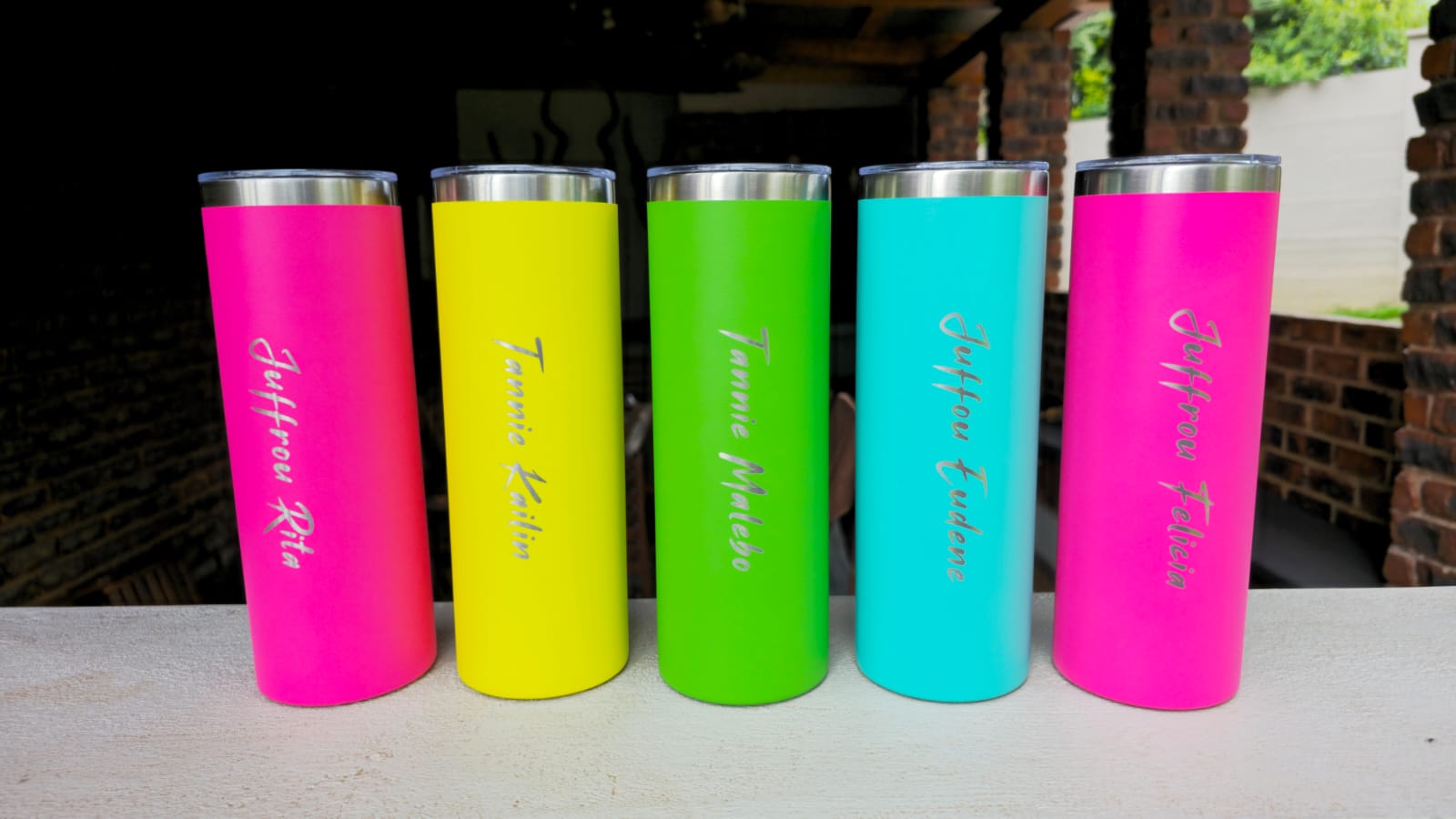 Collection of custom engraved tumblers by WESS